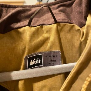 REI womens large rain coat runs small